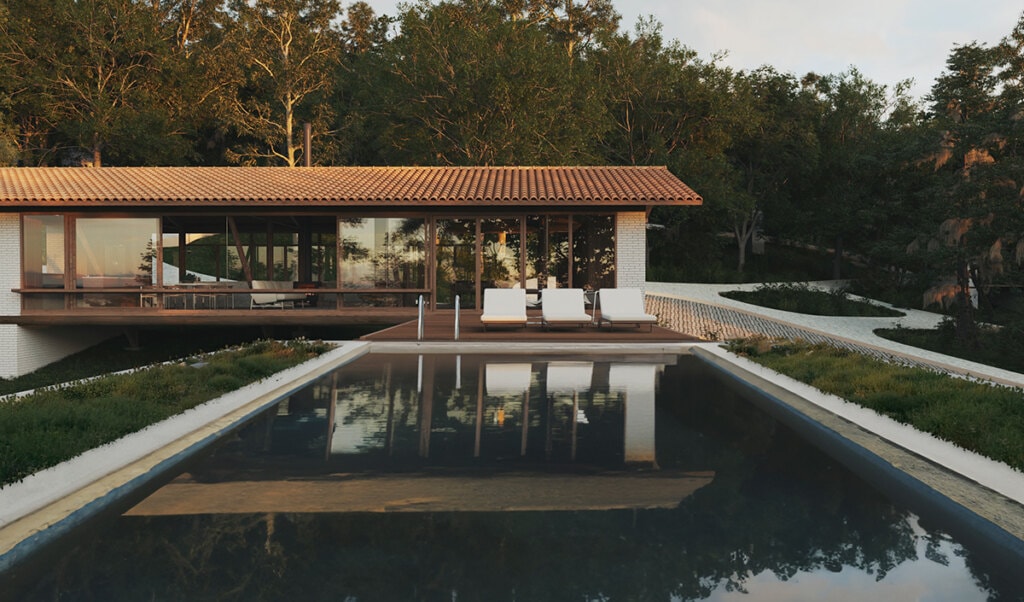 Visual da piscina em direção à edificação da área comum, pensada como um espaço de convivência, conforto e lazer