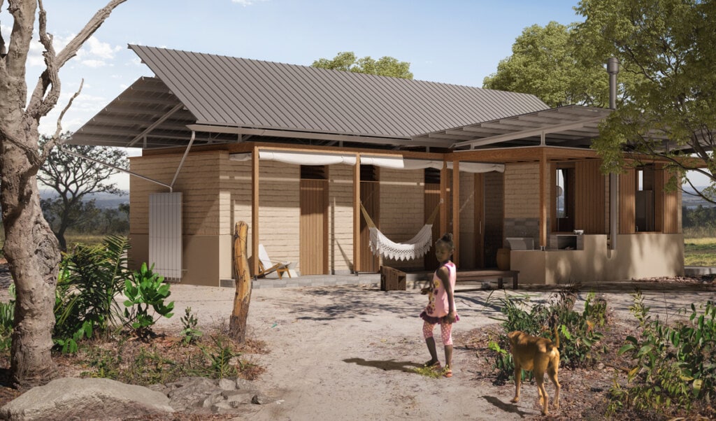 Vista da a varanda que dá acesso à área íntima. Nota-se a presença do fogão à lenha e o caráter gregário do espaço proposto, que pode ser ampliado.