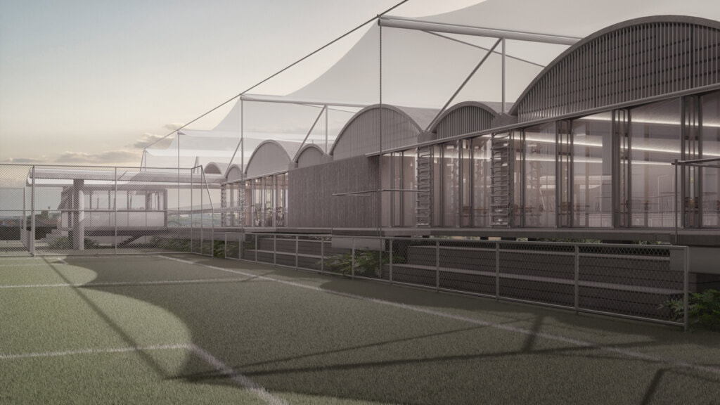 A elevação do térreo proporciona fácil acomodação das arquibancadas sob a proteção da cobertura do próprio edifício, integrando a área social ao esporte, permitindo ótima visibilidade do jogo.