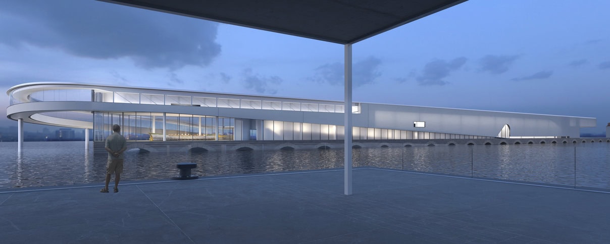 Fachada voltada para a praça olímpica, galeria inicial com visada profunda da colunata exposta internamente.