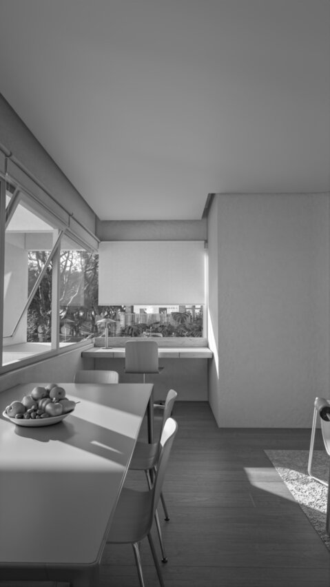 O espaço compartilhado de trabalho e jantar é iluminado diretamente.