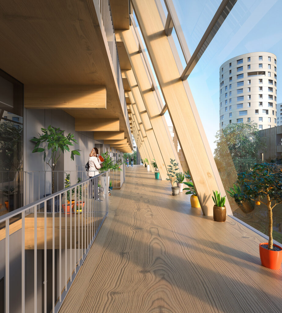 Um edifício mais baixo e linear, onde uma galeria horizontal altamente transparente para circulação e solários privativos nos apartamentos intensificam a relação entre o edifício e seu entorno imediato.